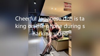 Cheerful Japanese doll is taking on the phone during sharking video